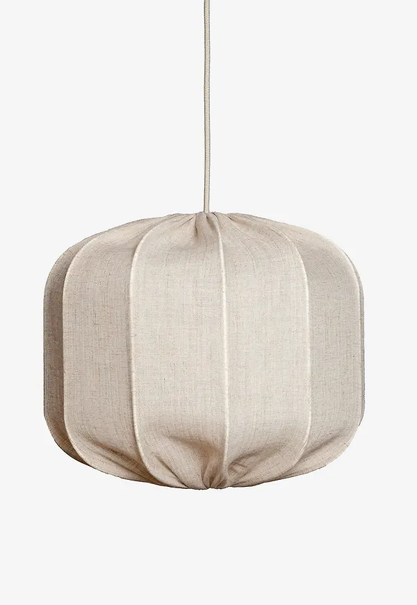 Vacker kaffebord i beiget från Alde & Lind.