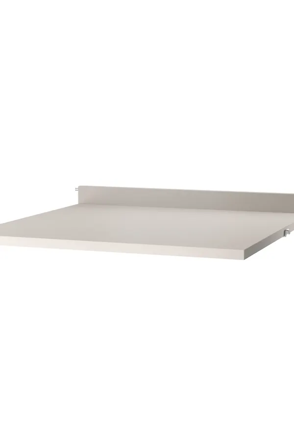 Fantastiskt snygg beige bord 2026 från String Furniture.