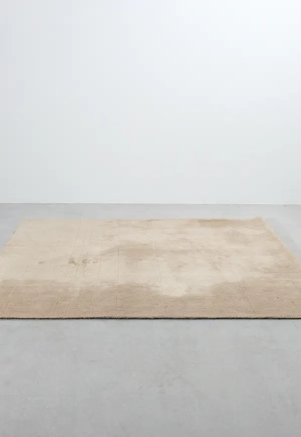 Beige Asplund-ullmatta i riktigt trendig modell.