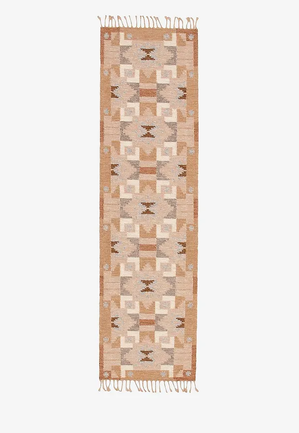 Guld Bargi-ullmatta i jättesnygg modell.