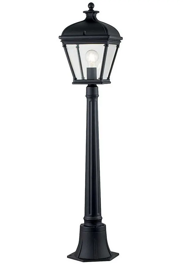 Stilren glödlampa i svart färg gjord i aluminium.