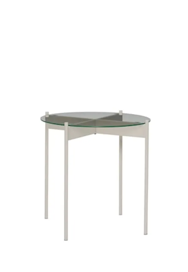 Exklusiv järnbord i beiget från Hübsch.