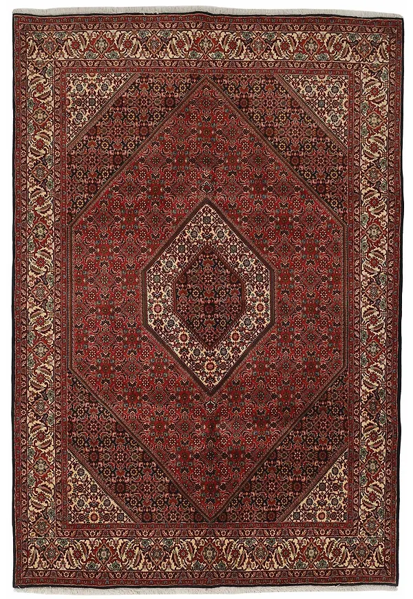 Stilriktig ullmatta i rött från Rezas.