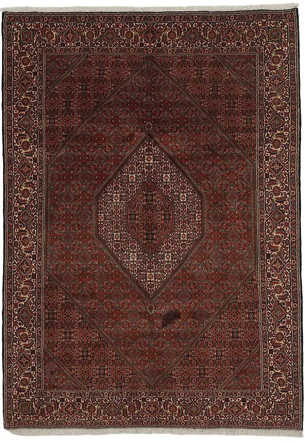 Cool röd matta i ull från Rezas.