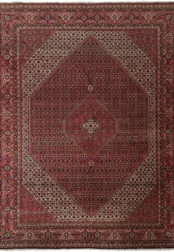 Röd Rezas-ullmatta i vacker modell.