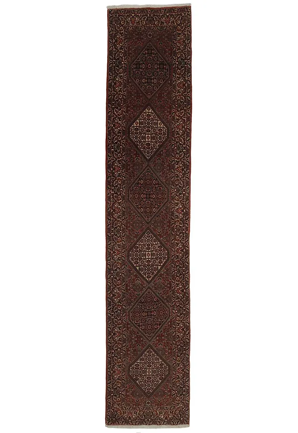 Riktigt snygg röd matta i ull från Rezas.