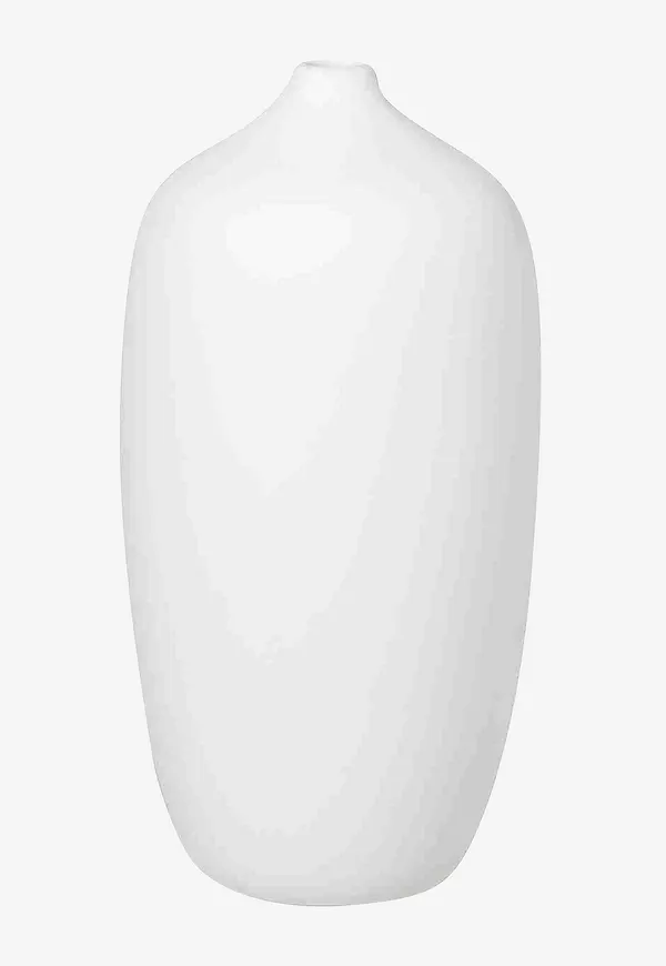 Vit Blomus-grupp i snygg modell.