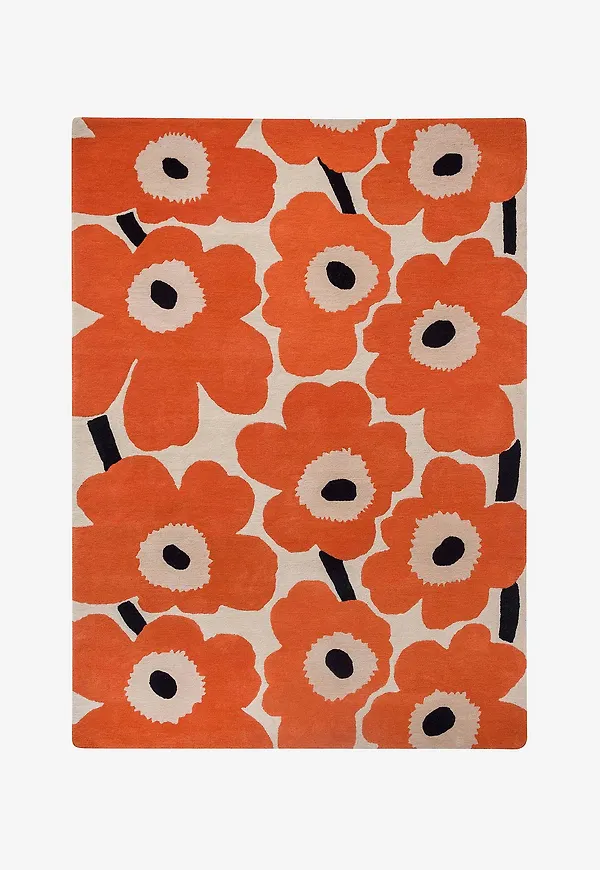 Härlig matta i orange färg gjord i ull.