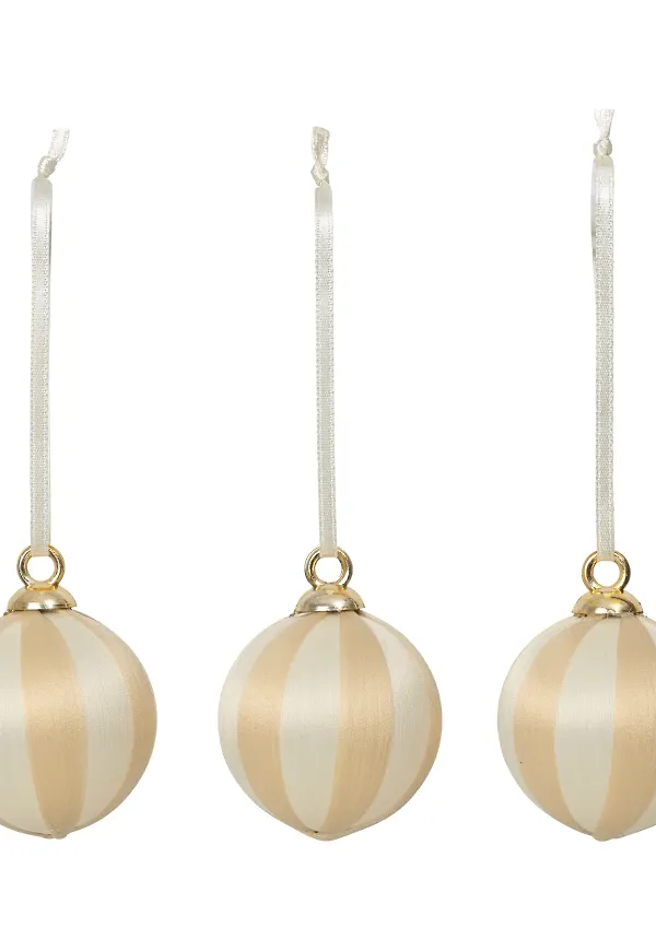 Beige Broste Copenhagen-julgranskula i mysig modell.