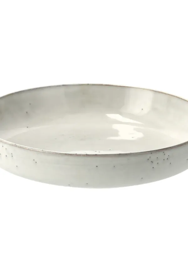Beige Broste Copenhagen-tallrik i stilren modell.