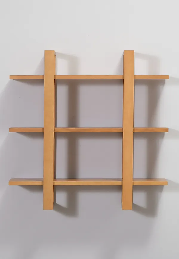 Beige Burrow-vägghylla i supersnygg modell.