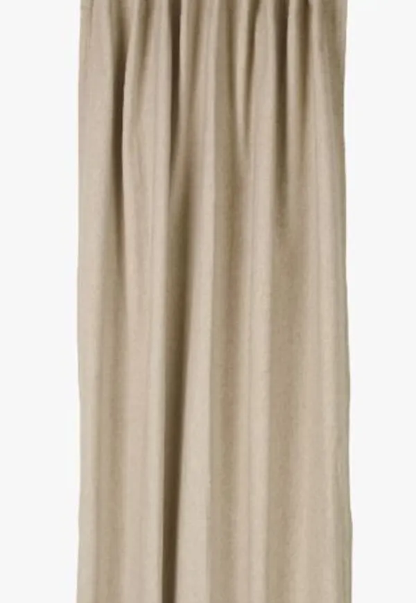 Beige hemtex-mörkläggningsgardin i mysig modell.