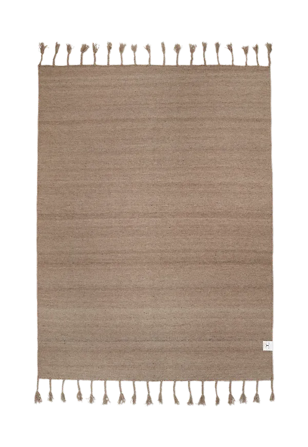 Beige Classic Collection-ullmatta i skön modell.