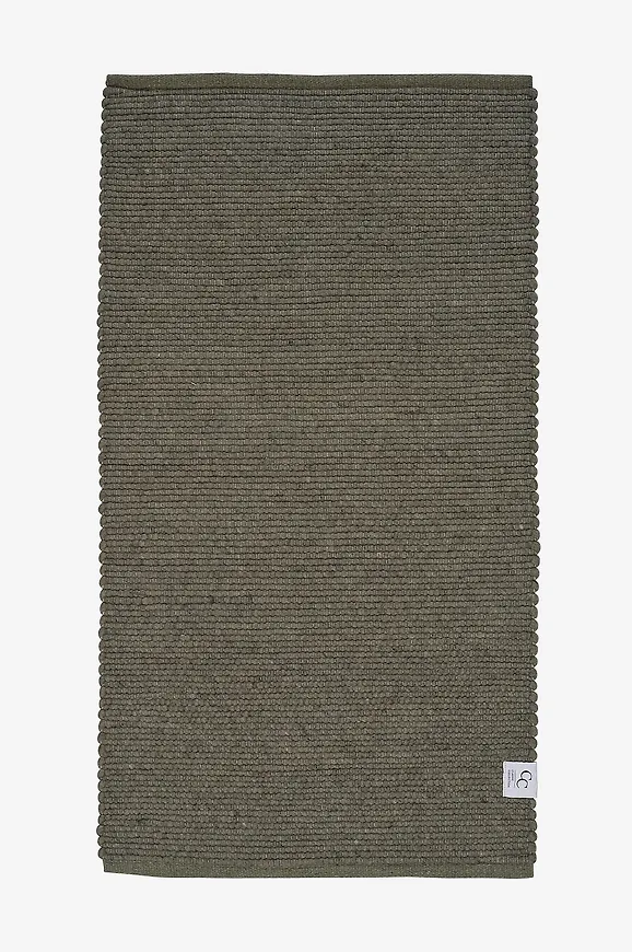 Riktigt trendig grön matta i ull från Classic Collection.