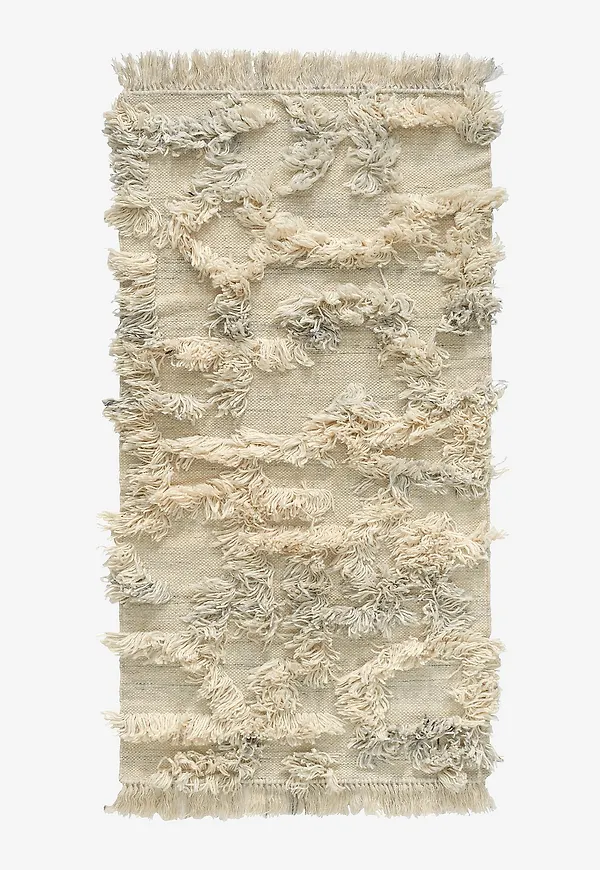 Moderiktig classic collection matta i grå färg gjord i ull.