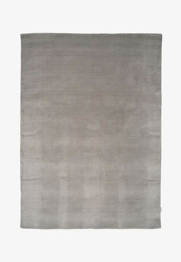 Jättesnygg classic collection matta i grå färg gjord i ull.