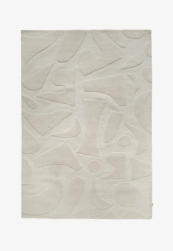 Komfortabel vit matta i ull från Classic Collection.