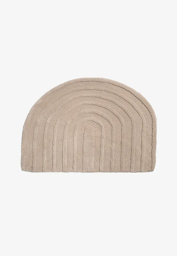Trendig dörr i beige färg gjord i ull.
