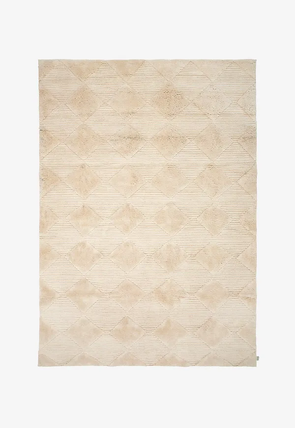 Snygg vit ullmatta 2026 från Classic Collection.