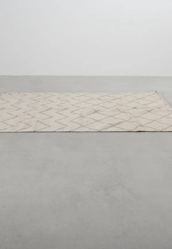Trendig ullmatta i beiget från Decotique.