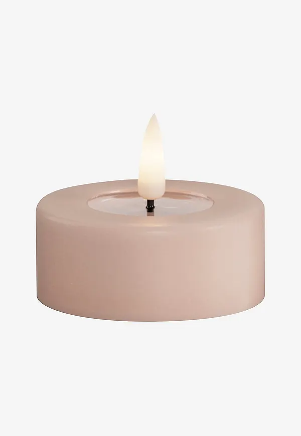 Otroligt fin värmeljus i rosa från DeluxeHomeart.