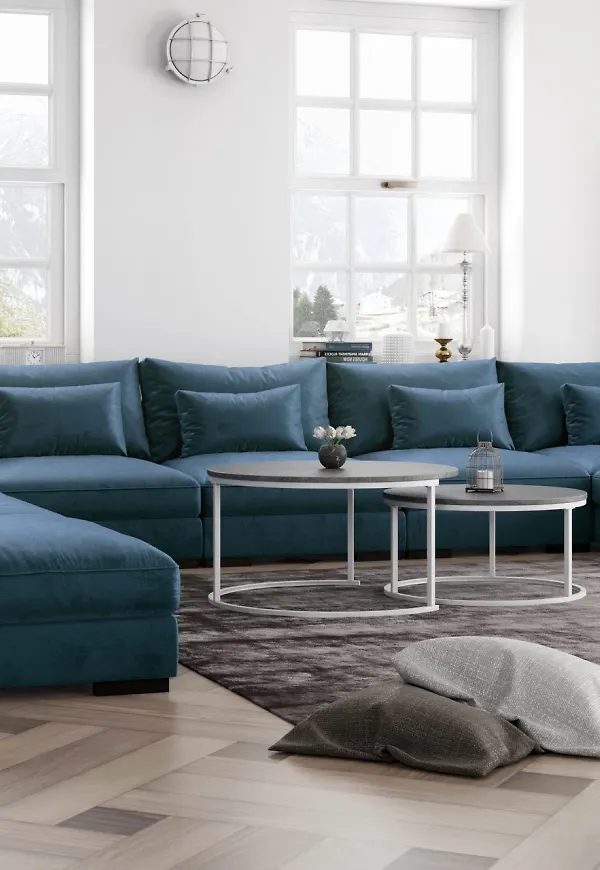 Blå Scandinavian Choice-soffa i riktigt trendig modell.