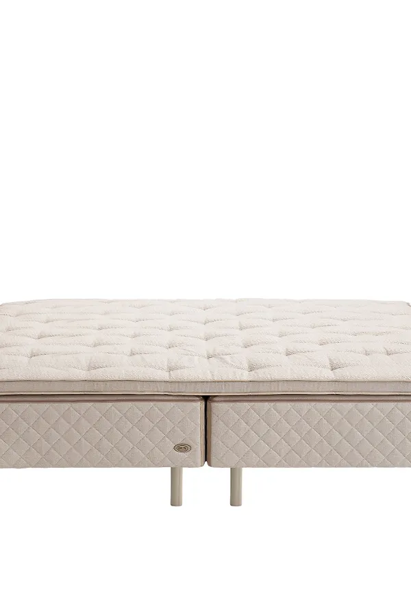 Beige DUX-lädersäng i otroligt snygg modell.