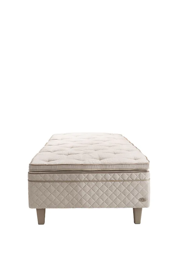 Riktigt trendig beige säng i läder från DUX.