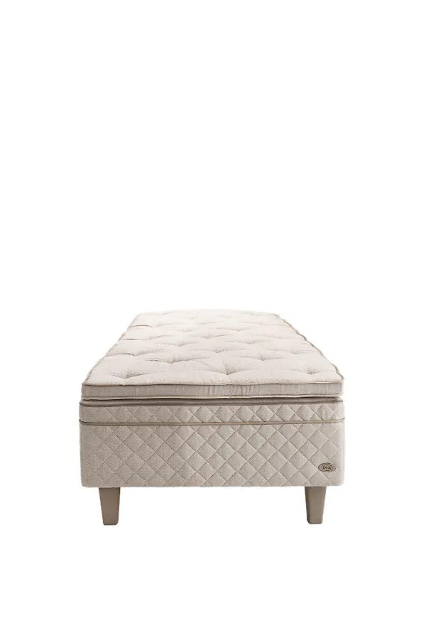 Moderiktig beige säng i bomull från DUX.