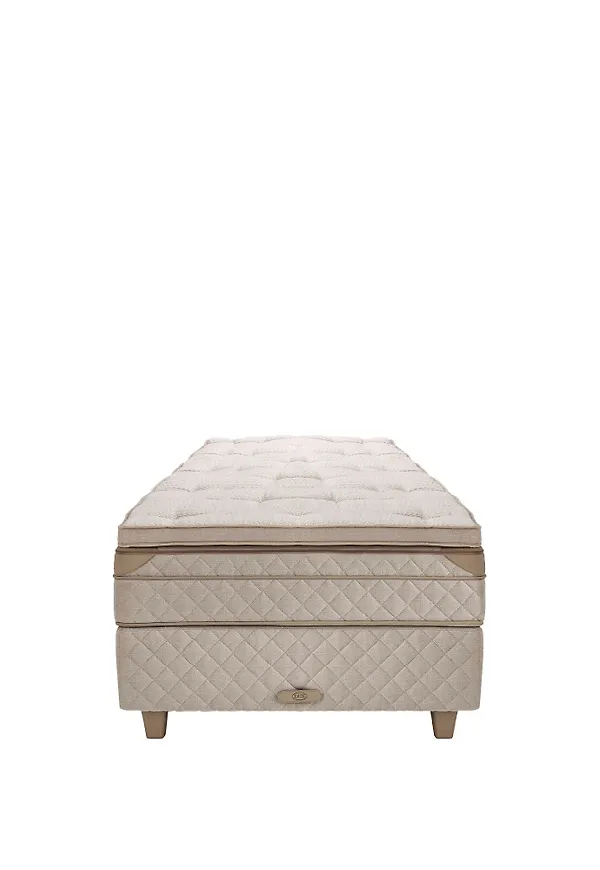 Fantastiskt fin säng i beige färg gjord i läder.