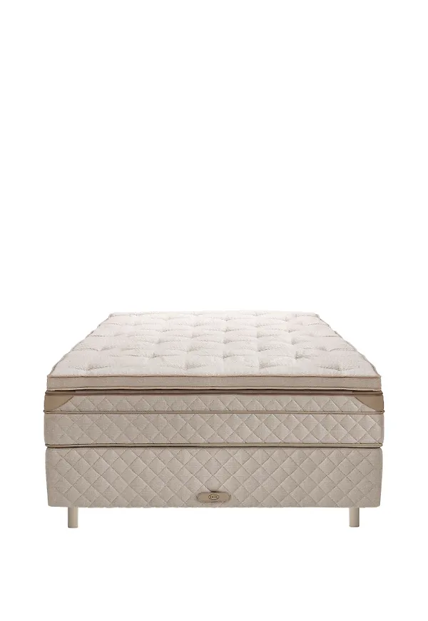 Komfortabel beige säng 2026 från DUX.