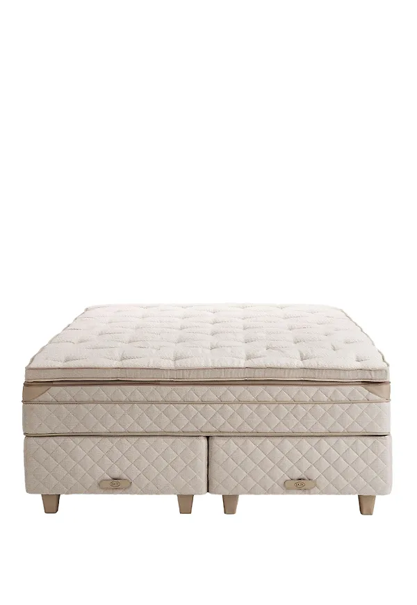 Beige DUX-lädersäng i fantastiskt fin modell.