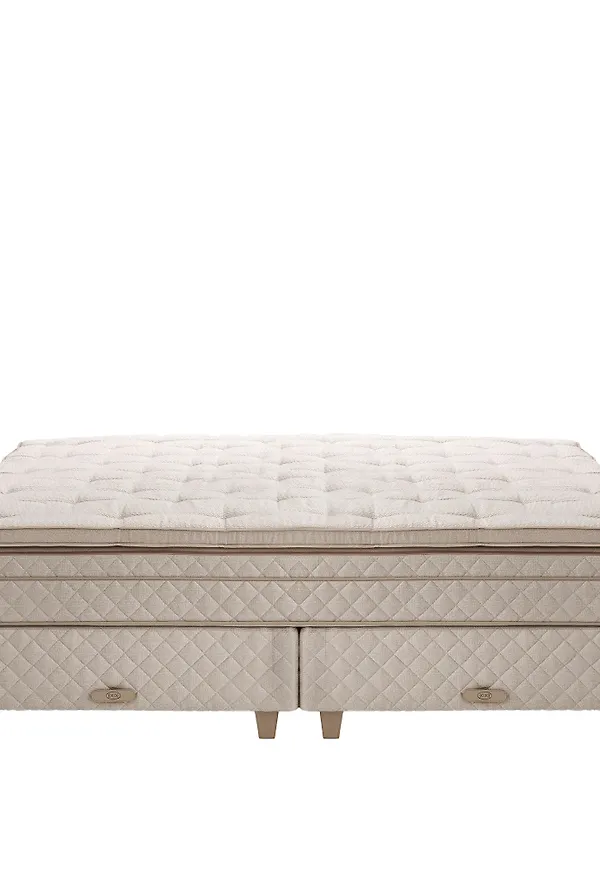 Beige DUX-säng i mysig modell.