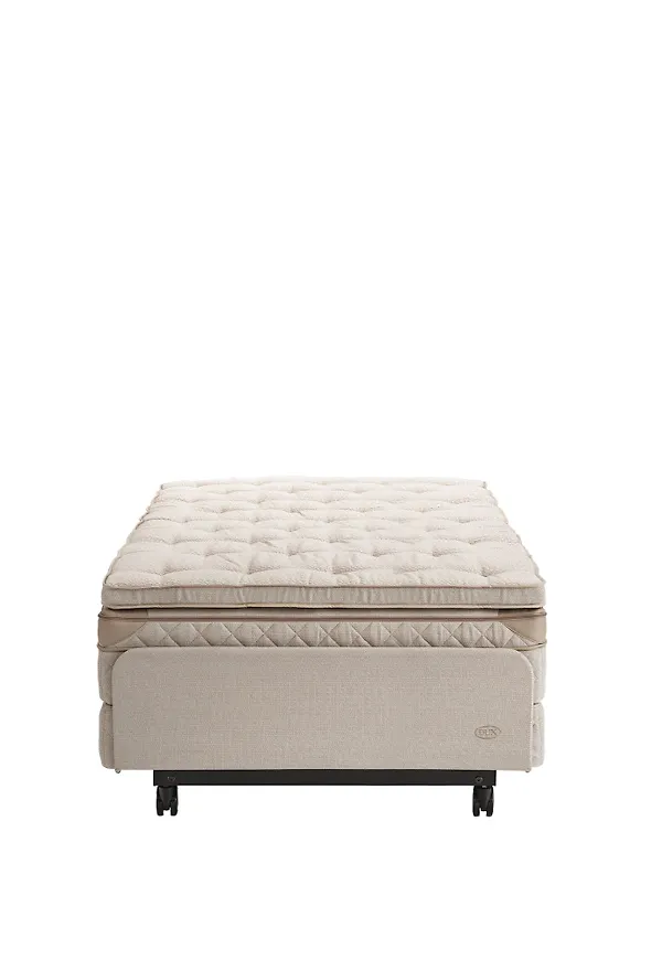 Ikonisk beige säng 2026 från DUX.