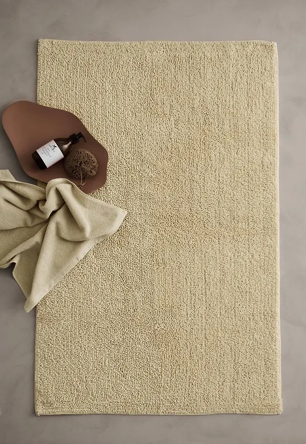 Gul Ellos-bomullsmatta i riktigt trendig modell.