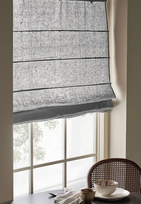 Söt hissgardin i grått från Ellos.