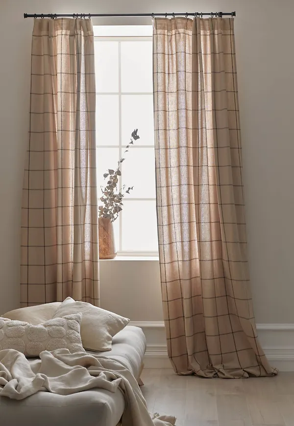 Otroligt snygg bomullsgardin i brunt från Ellos.