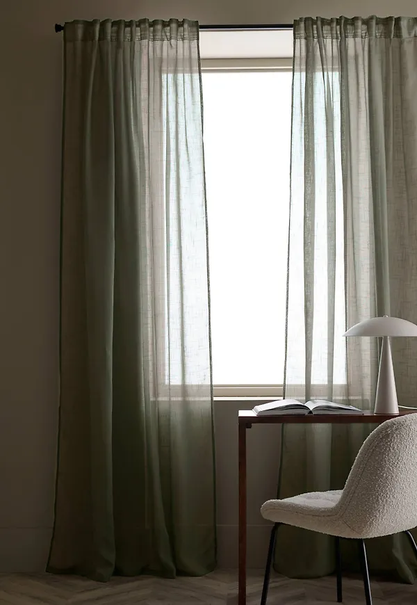 Grön Ellos-gardin i klassisk modell.