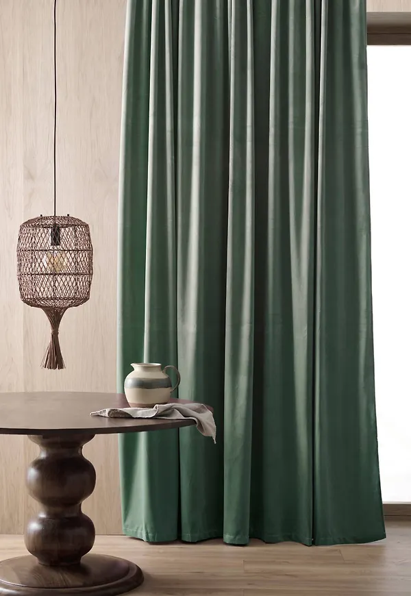 Khakigrön Ellos-gardin i ikonisk modell.