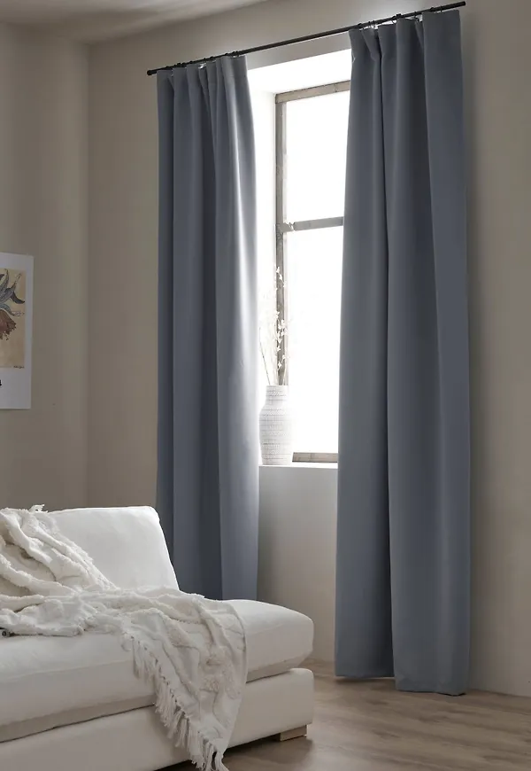 Riktigt fin gardin i dimblått från Ellos.