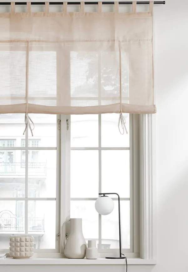 Beige Ellos-gardin i riktigt fin modell.