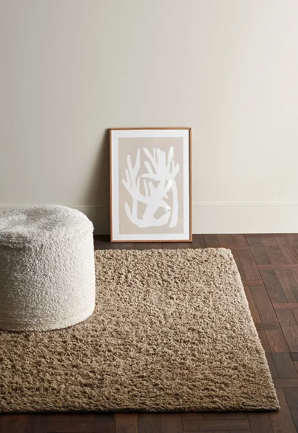 Beige Ellos-matta i smickrande modell.