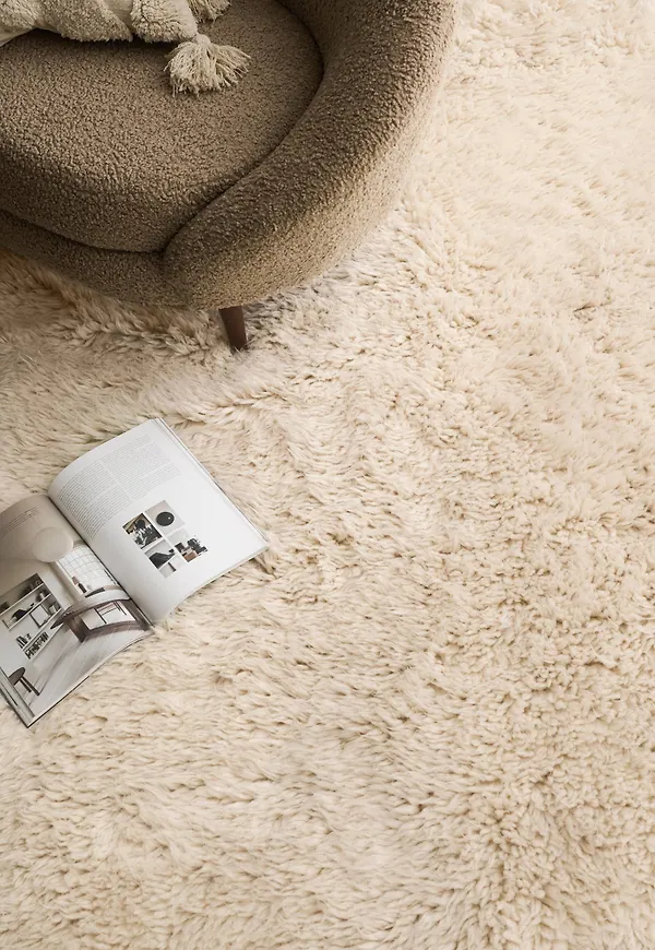 Riktigt fin ellos halkskyddsmatta i vit färg gjord i ull.