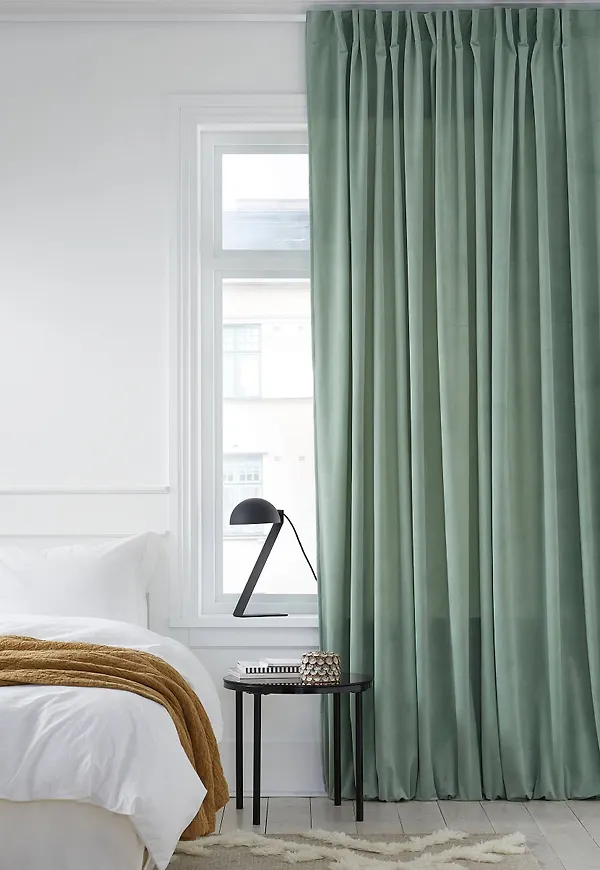 Ljusgrön Ellos-gardin i härlig modell.