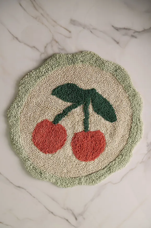 Grön Ellos Home-bomullsbadrumsmatta i ikonisk modell.