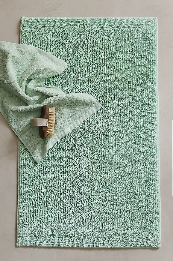 Grön Ellos Home-bomullsbadrumsmatta i superfin modell.