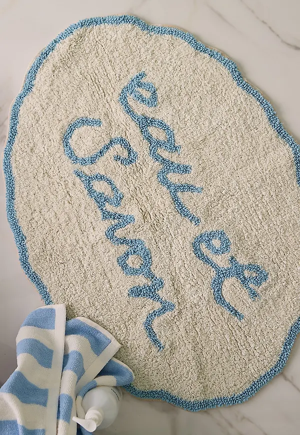 Stilriktig ellos home ellos matta i blå färg gjord i bomull.