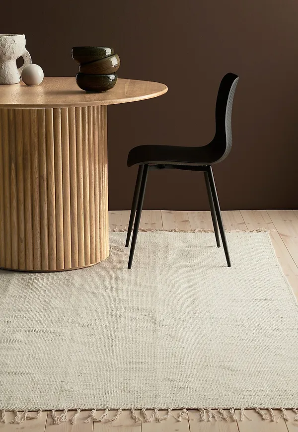 Trendig ellos home ellos matta i vit färg gjord i bomull.