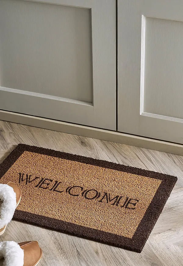 Stilren dörrmatta i brunt från Ellos Home.