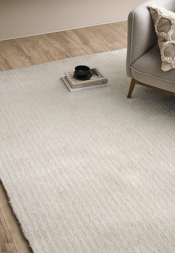 Vit Ellos Home-halkskyddsmatta i vacker modell.
